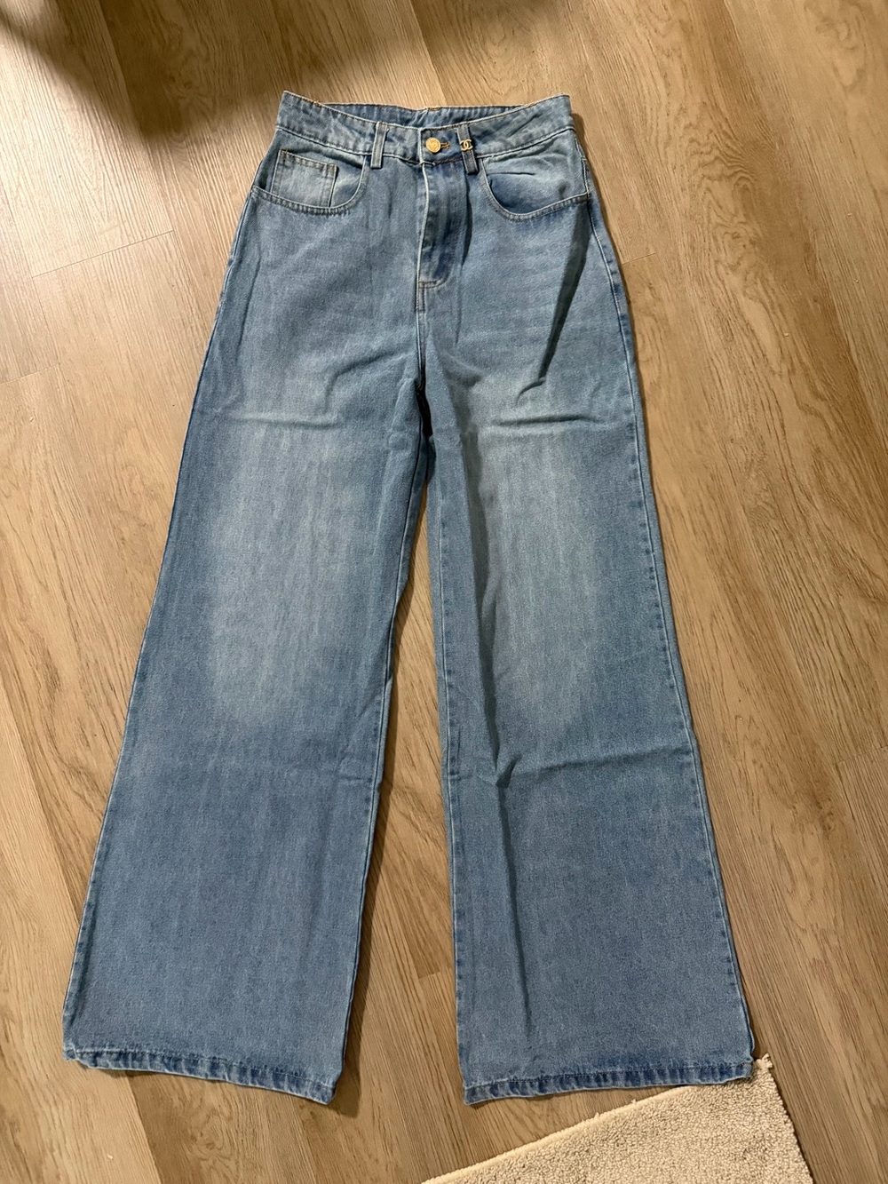 CHANEL Light Wash Wide-Leg Flared Jeans